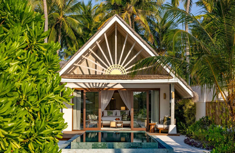 A beach villa with a pool at RAH GILI Maldives.