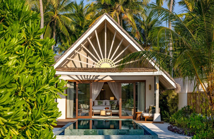 A beach villa with a pool at RAH GILI Maldives.