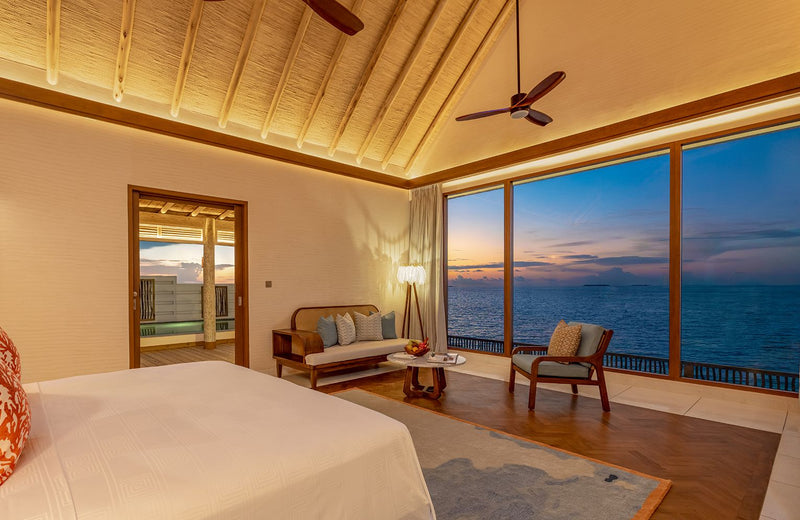 A bedroom with a sea view at RAH GILI Maldives.