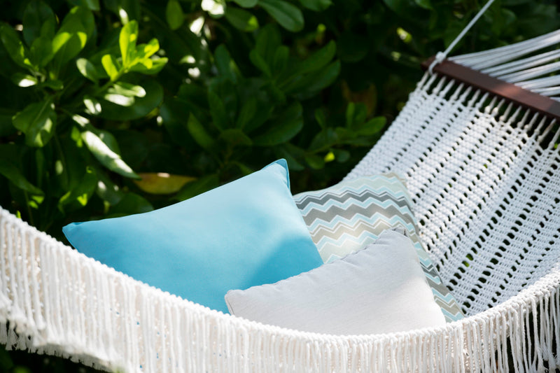 Waldorf Astoria Maldives Ithaafushi, South Malé Atoll: a hammock with cushions in a Beach Villa garden
