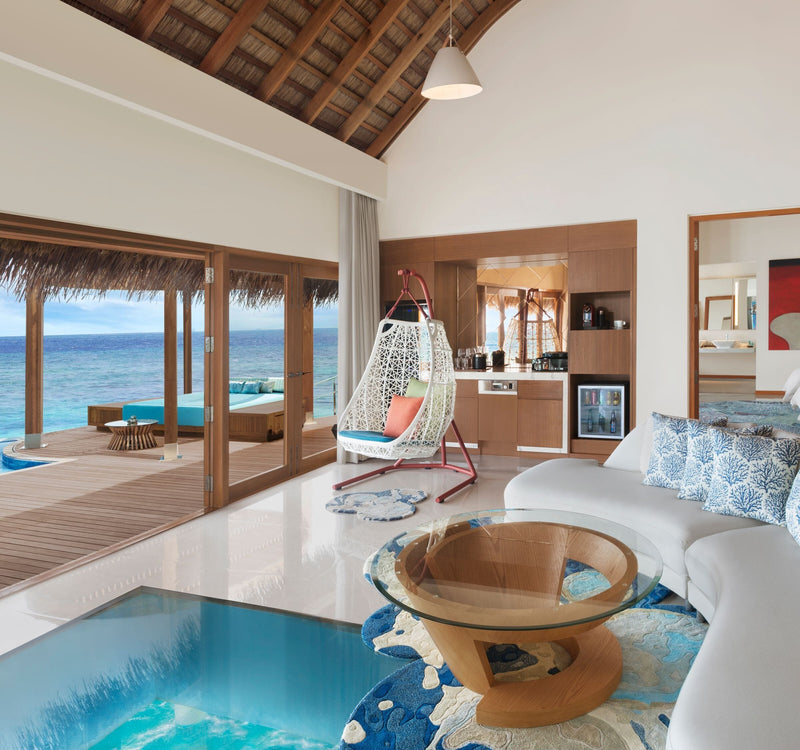 The living room of a Supreme Overwater Two-bedroom Villa at W Maldives