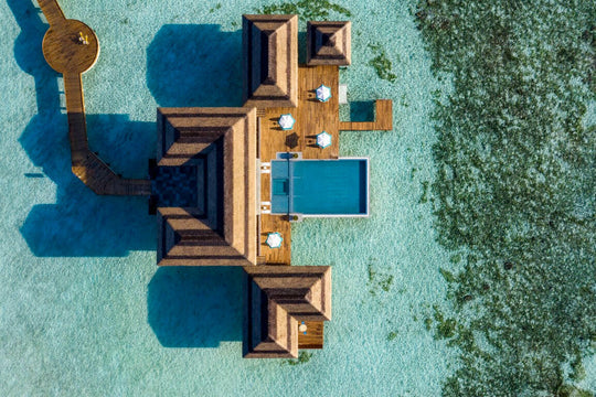 Pullman Maldives Maamutaa, Gaafu Alifu Atoll — overwater suite seen from above