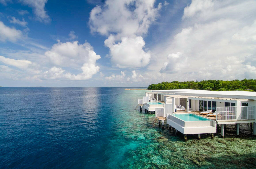 Amilla Maldives - 4 nights with Half board.