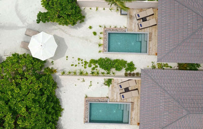 Beach Pool Villas at Brennia Kottefaru from directly above, private pools set among the trees